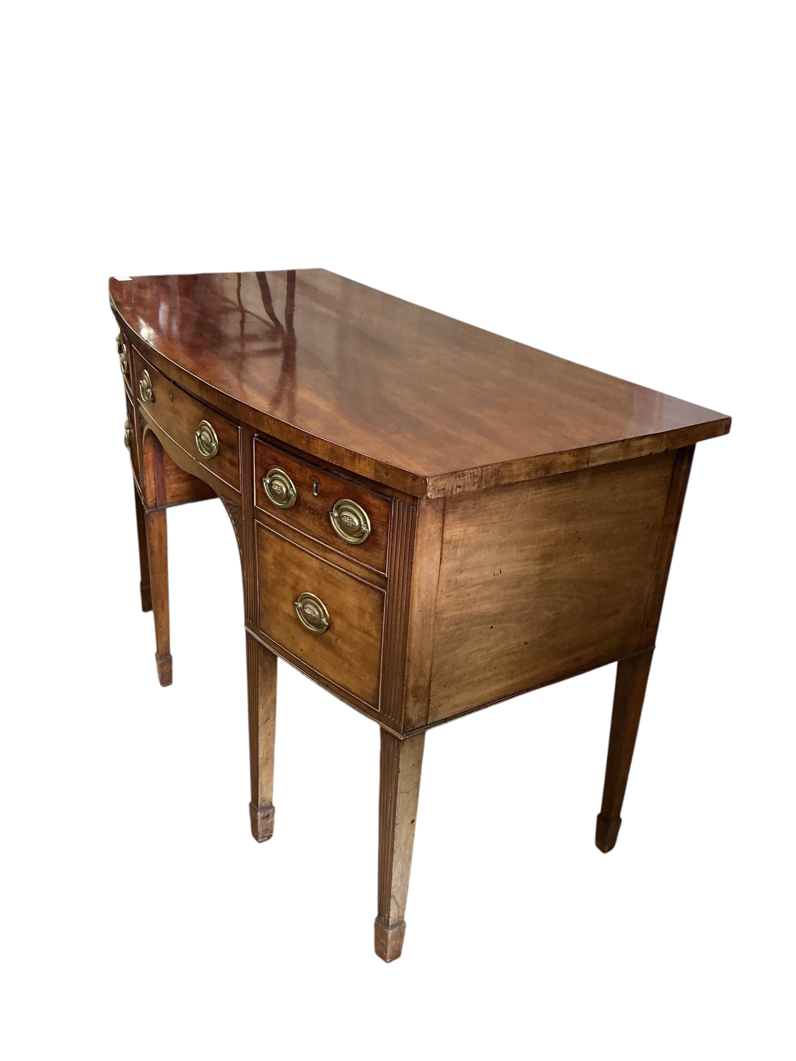 A small George III mahogany bowfront sideboard, width 138cm, depth 68cm, height 91cm